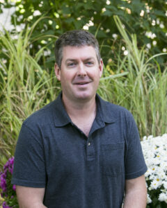 headshot of Tim 