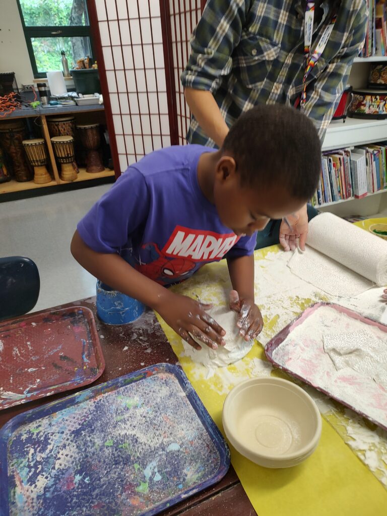 student builds with a plaster mold